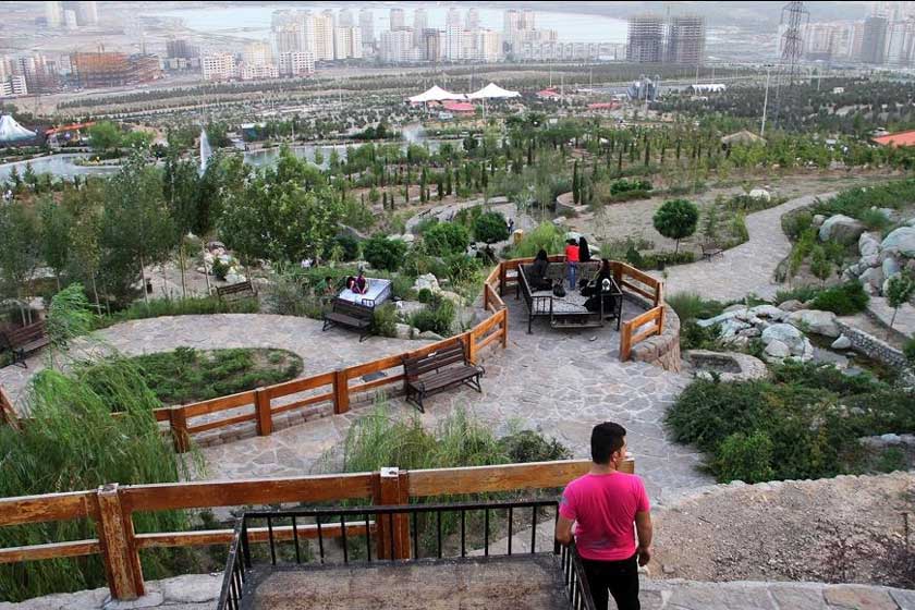 Walking paths through the green terraces of Tehran Waterfall Park
