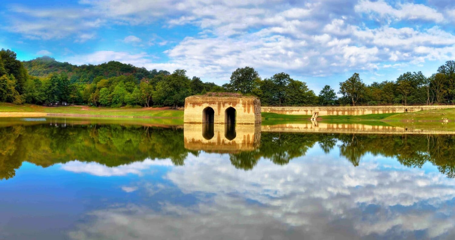 Abbas Abad Historical Complex in Sari with a reflective pool and traditional Iranian architecture