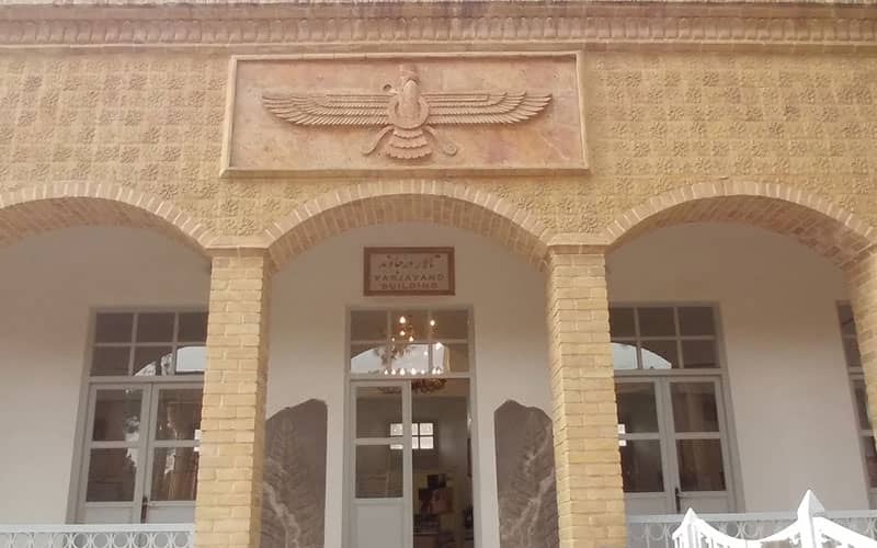 Gravestones in a Zoroastrian cemetery bearing the Farvahar symbol