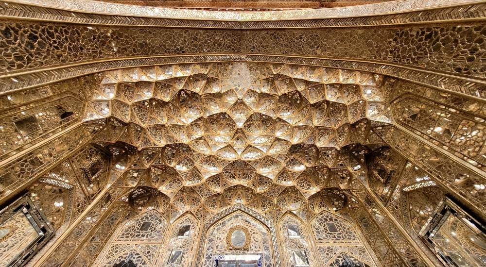 Mirror work details showing geometric patterns and light reflection