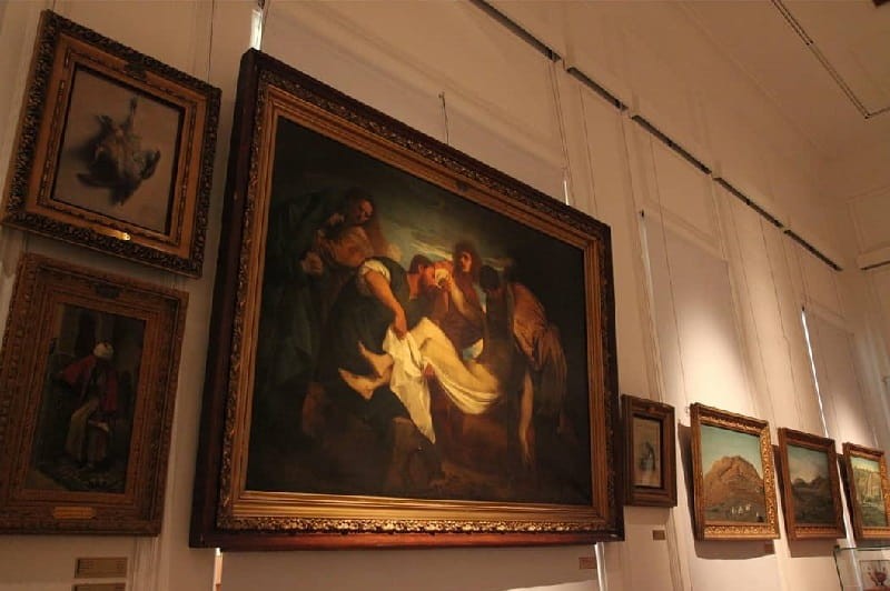 Paintings and museum exhibits inside Baharestan Mansion