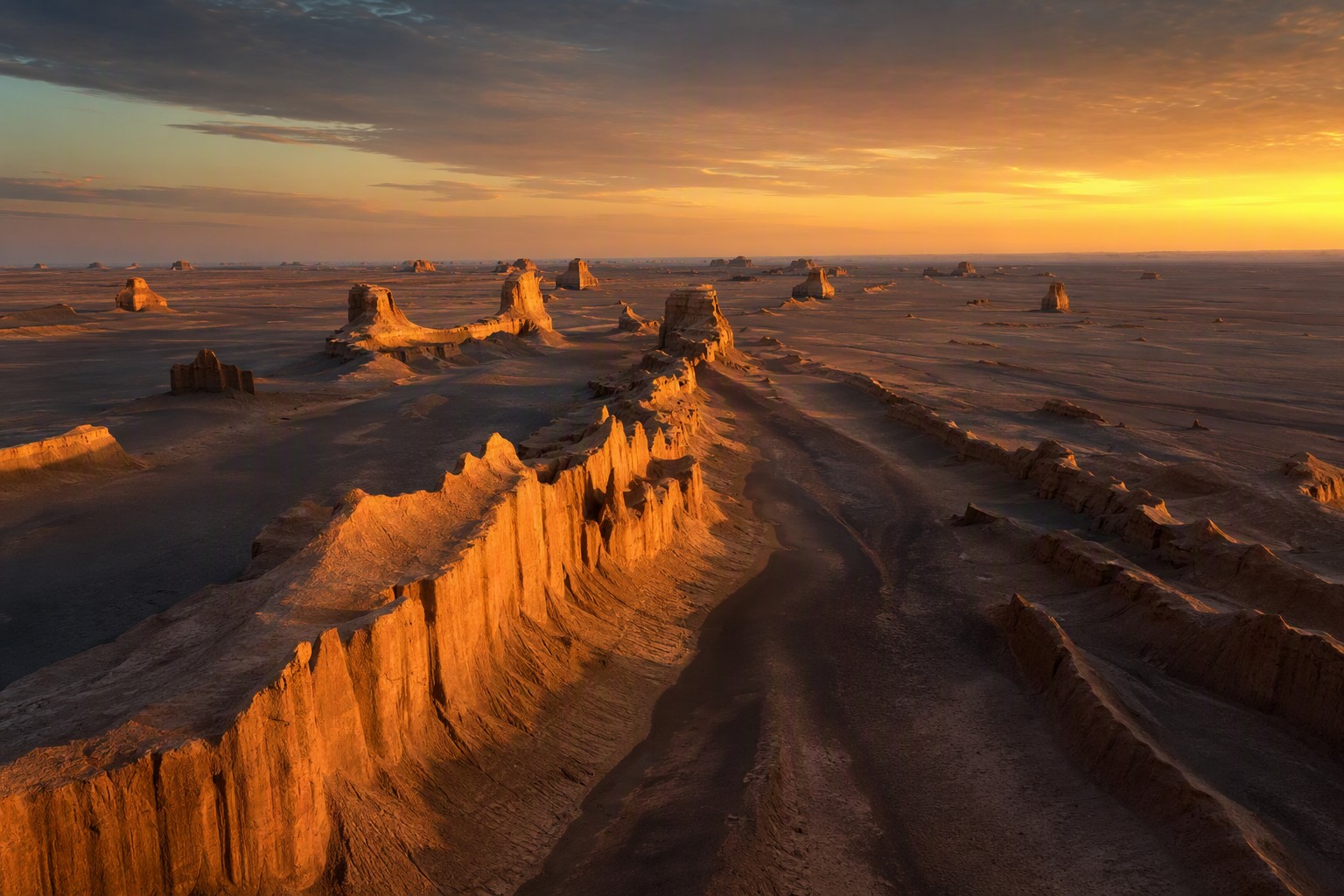 Kalut sand ridges of the Lut Desert at sunset