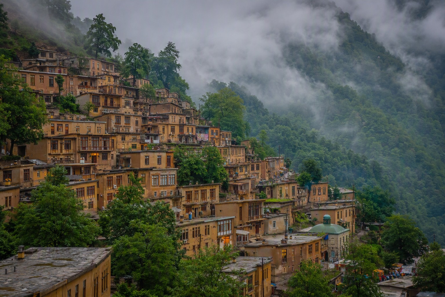 Masuleh village terraced on a green mountainside in northern Iran
