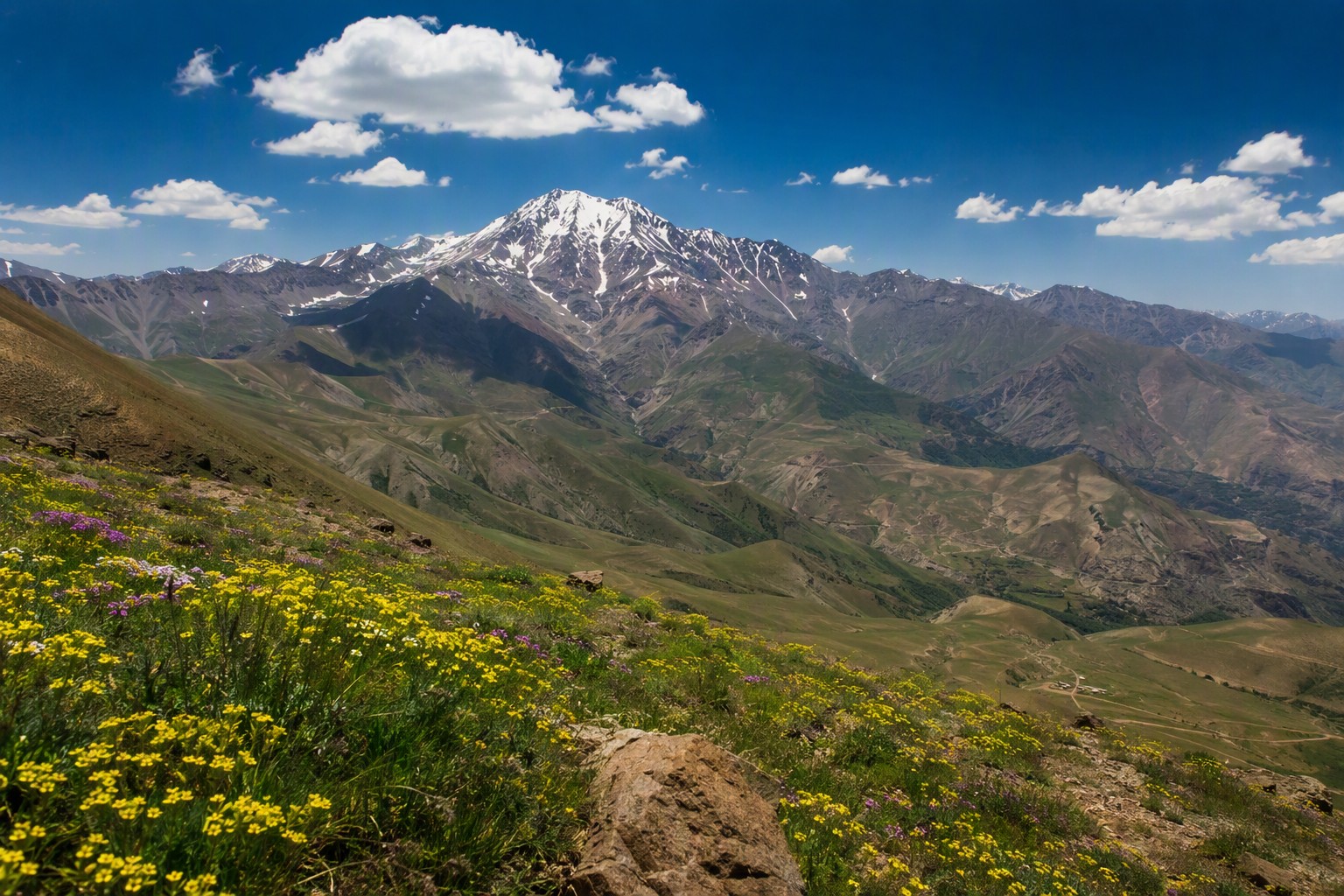 Mountain landscape of the Alborz range with alpine meadows in summer