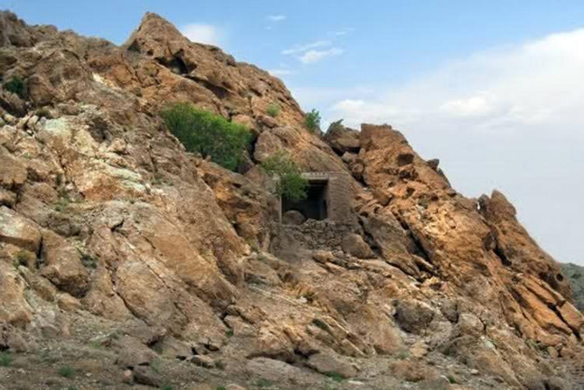 Cave-studded limestone cliffs in the Paraw Mountains east of Kermanshah
