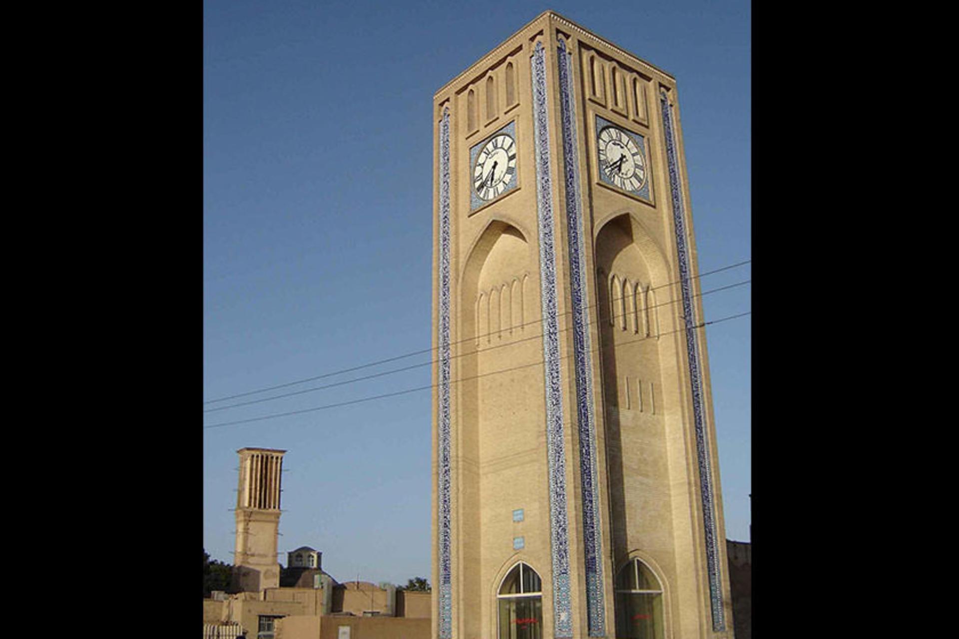 Clock tower detail showing brickwork and tiles