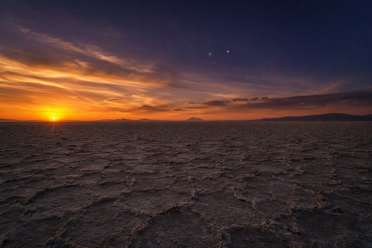 Sunset over the desert plain