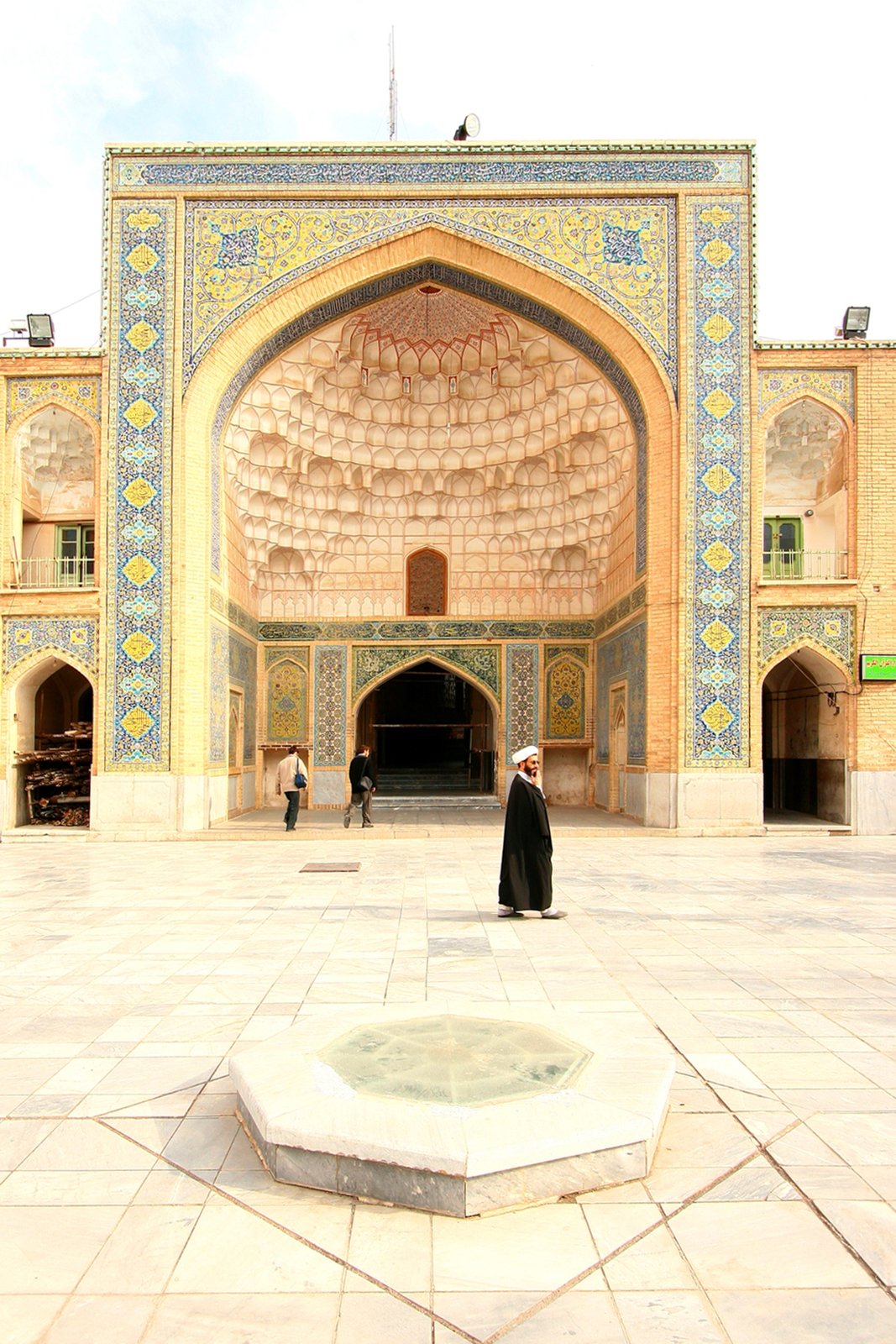 Interior arches and calligraphic inscriptions at Fayzia School