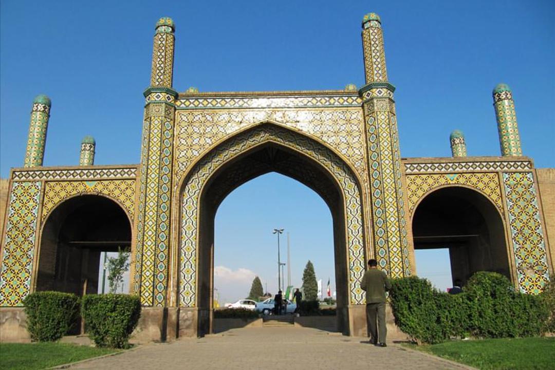 Close-up of Naser al-Din Shah era tilework on the gate facade