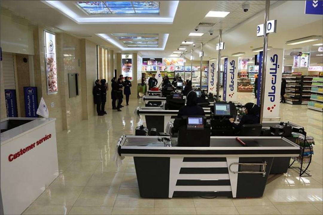 Interior of a modern hypermarket with shelves of local products