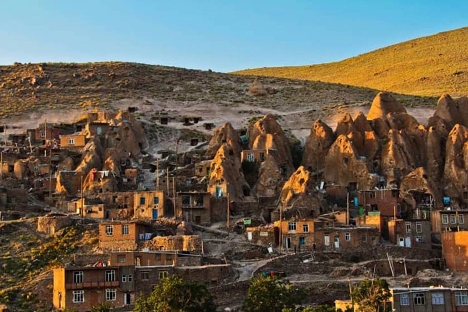 Inside a traditional rock-cut home in Kandovan, with low ceilings and small windows carved from volcanic stone
