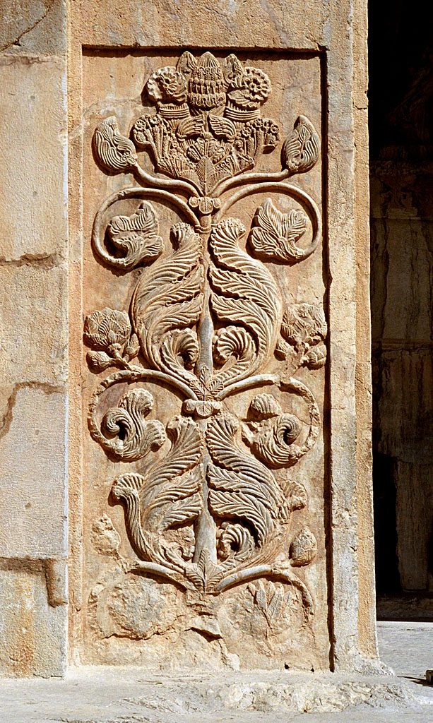 The tree of life motif carved above the arch at Taq-e Bostan