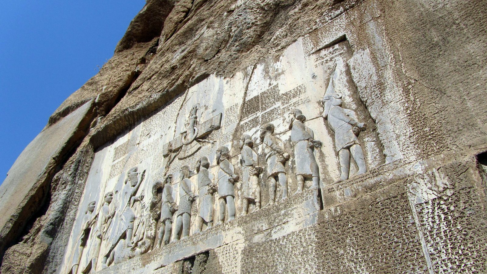 The Bisotun Inscription carved into the cliff face, a UNESCO World Heritage Site