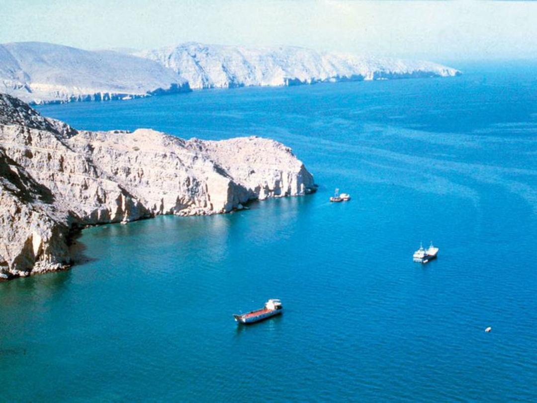 Oil tankers passing through the narrow shipping lane