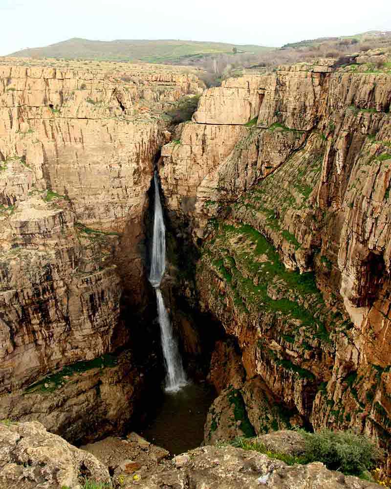 The stepped cascade of Piran Waterfall seen from below