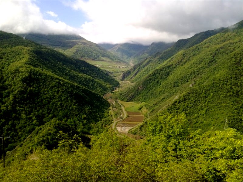 Mist-shrouded mountain trail near Afratakhteh