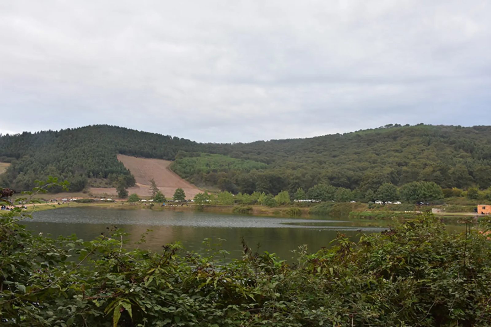 Tushan Lake lying inside green forest south of the city