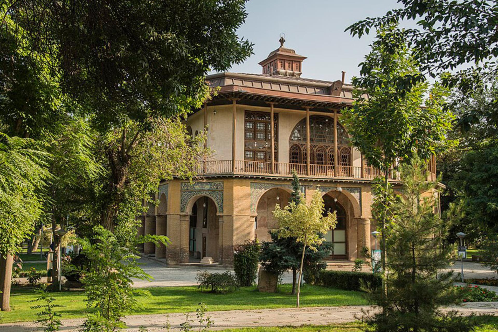 The Chehel Sotun mansion standing in its garden in Qazvin