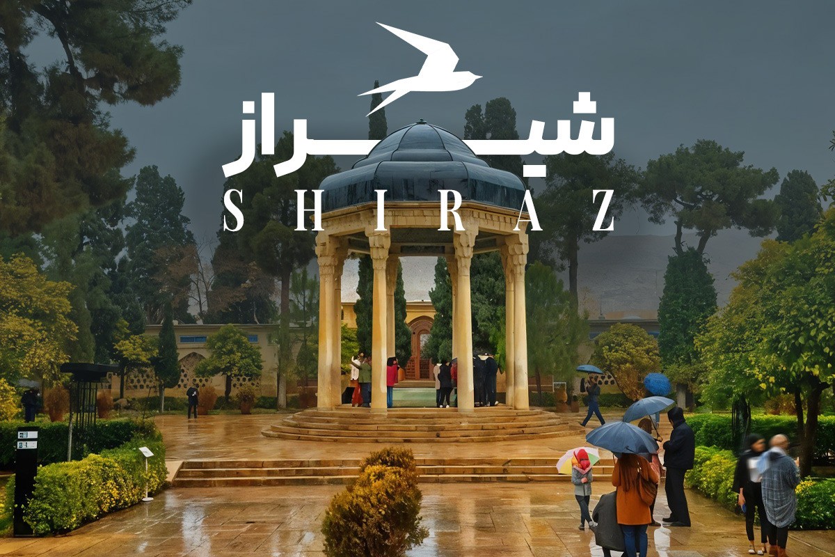 Historic monument in Shiraz with intricate stone carvings and grand columns