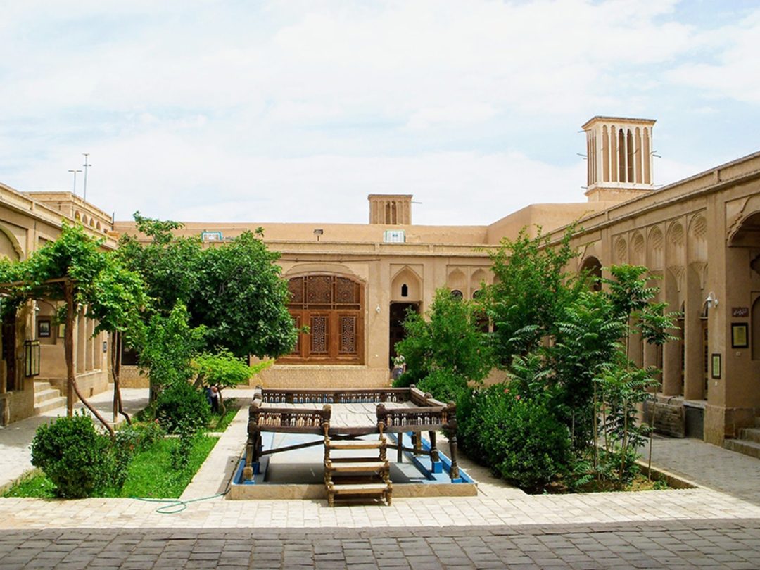 The quiet garden and entrance of the Yazd Fire Temple